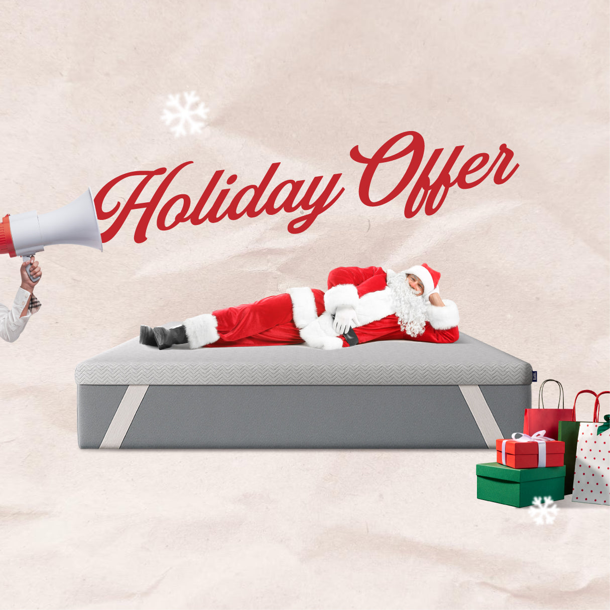 Person in Santa Claus outfit lying on a mattress with 'Holiday Offer' text and Christmas decorations.