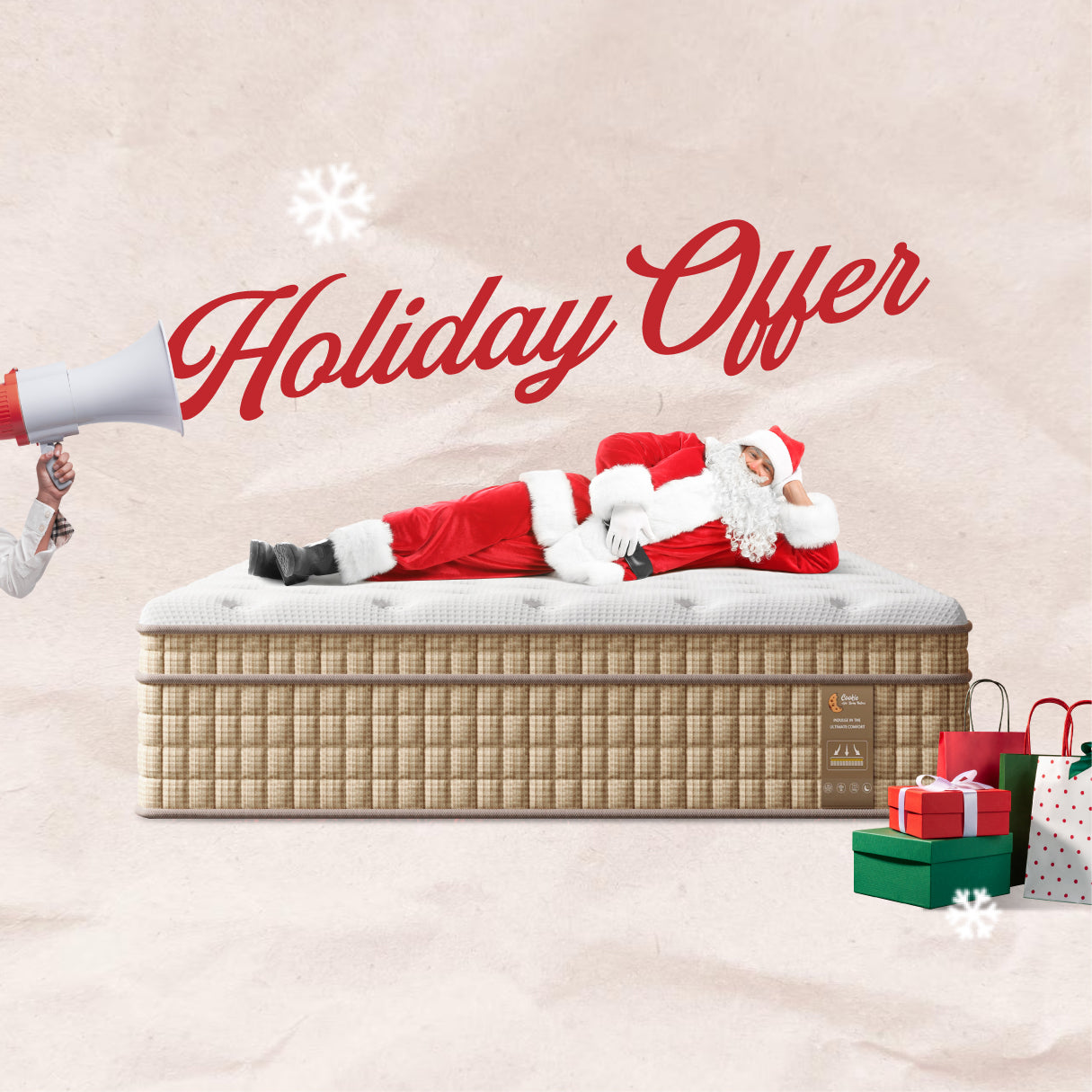 Person in Santa Claus outfit lying on a mattress with 'Holiday Offer' text and Christmas decorations.