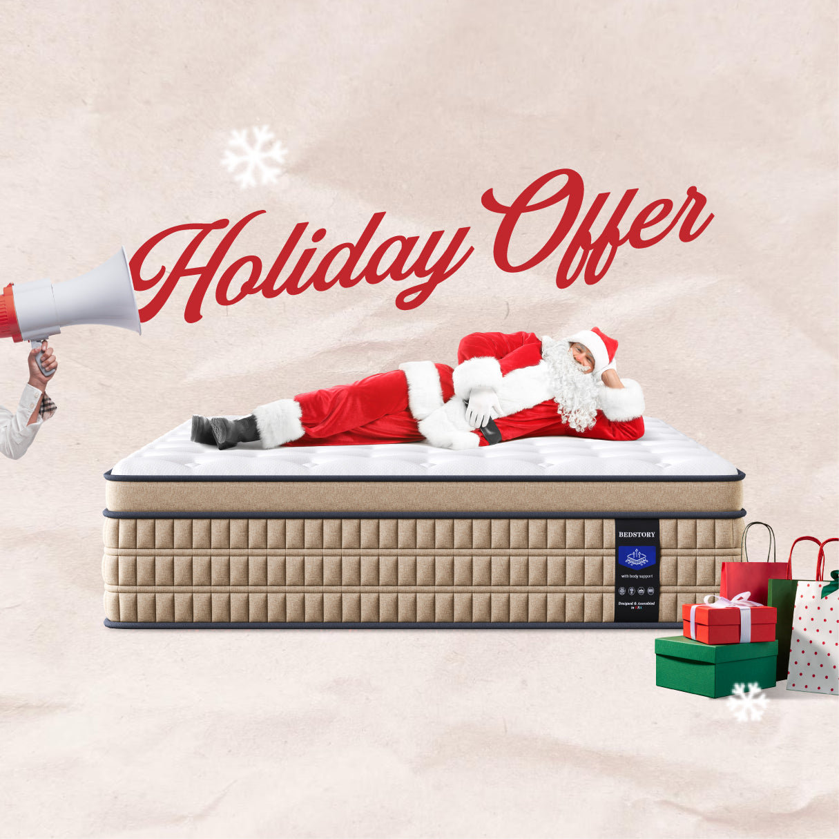 Person in Santa Claus outfit lying on a mattress with 'Holiday Offer' text and Christmas decorations.